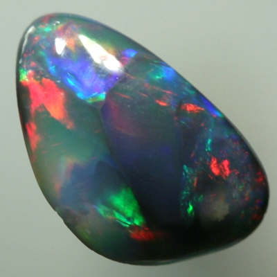 SOLID BLACK OPAL Bright red and turquoise rolling flashes